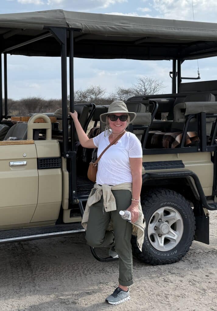 International travel agent on safari adventure in Africa.